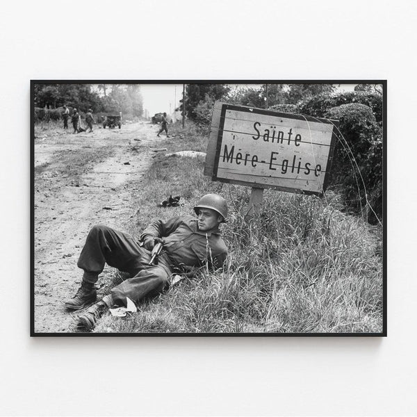 Normandy Landing Poster - Resting American Paratrooper near Sainte-Mère-Église