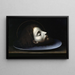 La Tête de Saint Jean-Baptiste - After Andrea Solario — framed artwork on a wall