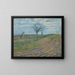 Terre labourée en hiver avec un homme portant un fagot - Camille Pissarro — framed artwork on a wall