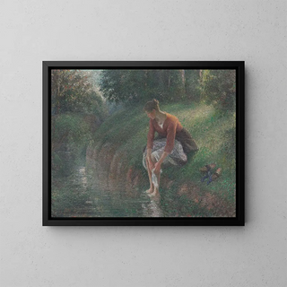 Woman bathing her feet in a stream - Camille Pissarro — framed artwork on a wall