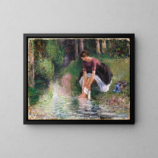 Woman washing her feet in a stream - Camille Pissarro — framed artwork on a wall