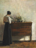 Interior painting with the artist's woman standing near a chest of drawers and reading - Carl Holse — artwork view