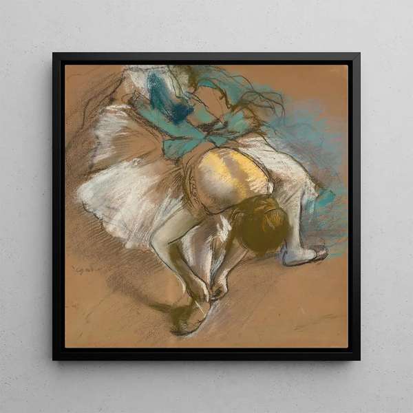 Danseuse attaching her slipper - Edgar Degas — framed artwork on a wall