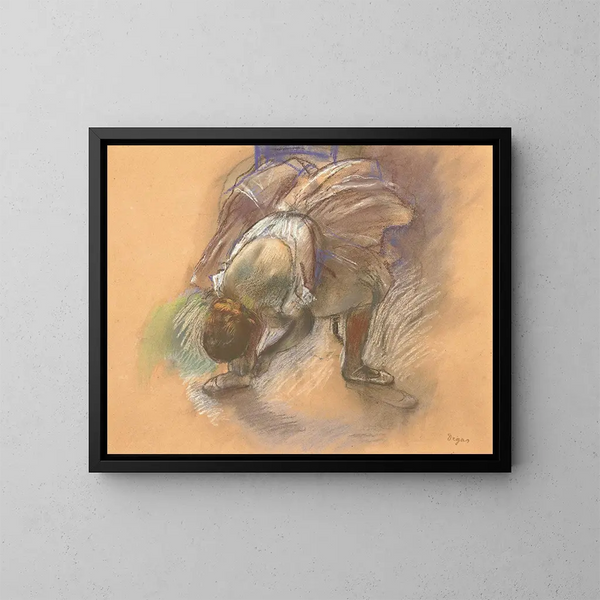 a Dancer Adjusting Her Shoe - Edgar Degas — framed artwork on a wall