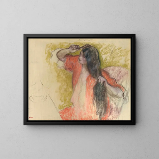Woman in a Red Robe Styling Hair - Edgar Degas — framed artwork on a wall