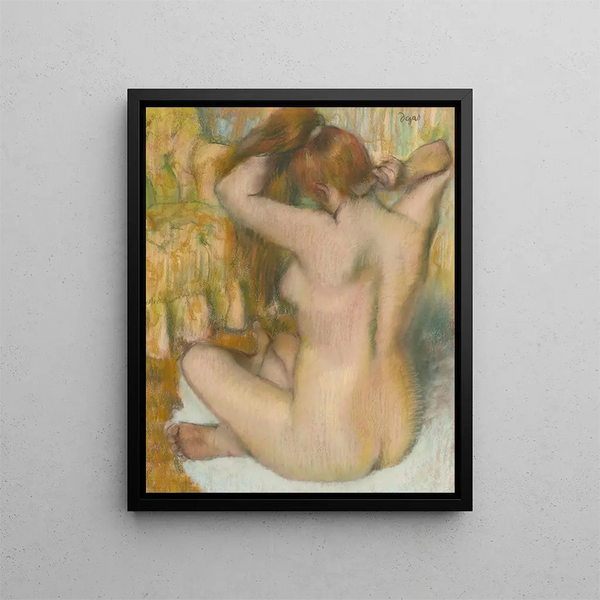 a nude woman from behind styling her hair, woman painting herself - Edgar Degas — framed artwork on a wall