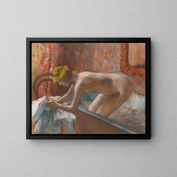 a woman emerging from the bath - Edgar Degas — framed artwork on a wall