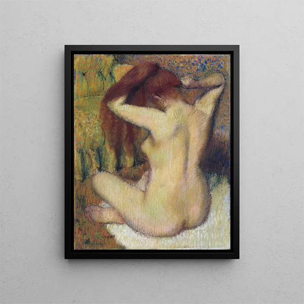 Woman Combing Her Hair - Edgar Degas — framed artwork on a wall