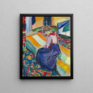 Woman sitting on a sofa - Edvard Munch — framed artwork on a wall