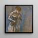 Woman putting on her corset - Edgar Degas — framed artwork on a wall