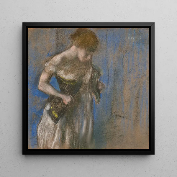 Woman putting on her corset - Edgar Degas — framed artwork on a wall
