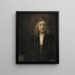 Young man wearing a cap decorated with pearls - School of Rembrandt van Rijn — framed artwork on a wall