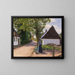 Danois village street with peasant woman and milkman - Hans Andersen Brendekilde — framed artwork on a wall