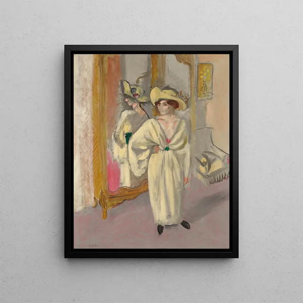 Woman in White Standing in Front of a Mirror - Henri Matisse — framed artwork on a wall