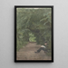 Man reading in a forest alley - Jan Veth — framed artwork on a wall