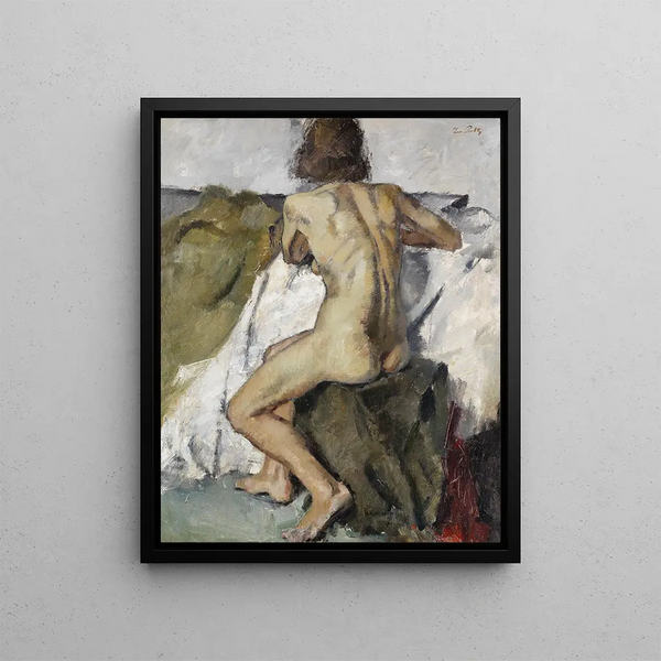 a Nude Woman Sitting Backwards - Leo Putz — framed artwork on a wall