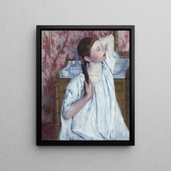 Girl arranging her hair - Mary Cassatt — framed artwork on a wall