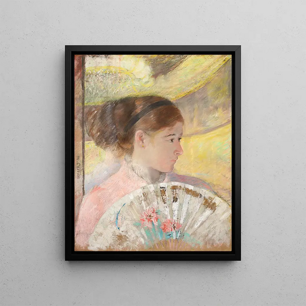 Young woman in a box looking to the right - Mary Cassatt — framed artwork on a wall