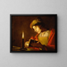 A young man reading by candlelight - Matthias Stom — framed artwork on a wall