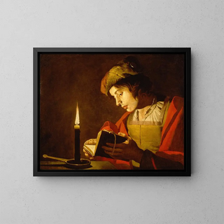 A young man reading by candlelight - Matthias Stom — framed artwork on a wall