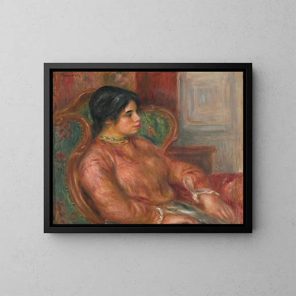 Woman in a Green Armchair - Pierre-Auguste Renoir — framed artwork on a wall