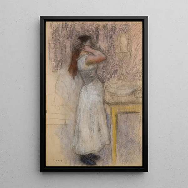 Young woman at her toilette - Pierre-Auguste Renoir — framed artwork on a wall