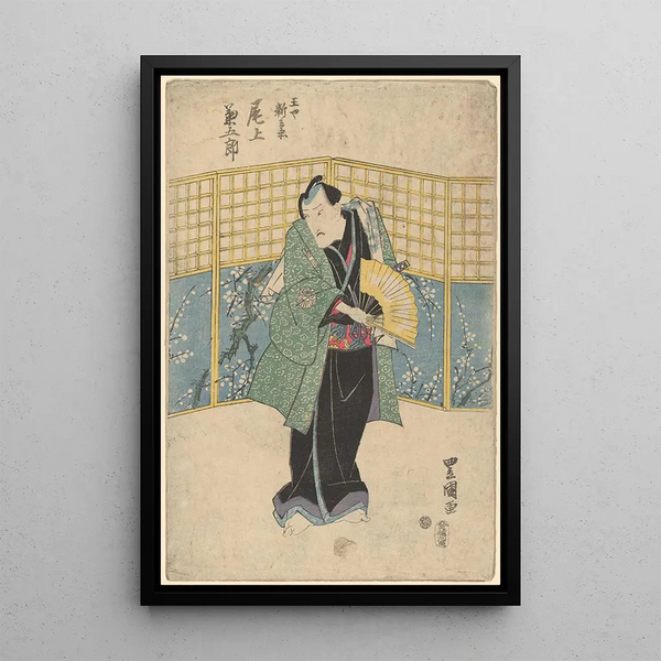 Actor in green robe with yellow fan - Toyokuni Utagawa — framed artwork on a wall