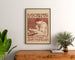 Art Nouveau – Elias van Bommel – Theo Molkenboer poster, framed above a wooden sideboard between plants.