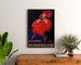 Vintage Cognac Richarpailloud advertisement poster, framed above a wooden dresser between plants.