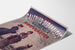 Vintage advertisement Galeries sedanaises, Nouveautés, shown on a curved sheet, viewed in perspective.