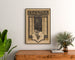 Vintage theatre poster – Electra – Richard Roland Holst, framed above a wooden dresser, between plants.