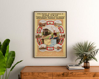 Vintage travel poster – Amsterdam, Marken and Volendam, framed above a wooden sideboard between plants.