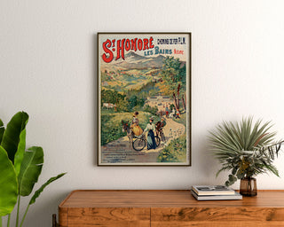 Vintage tourist poster – Saint-Honoré-les-Bains, thermal waters, framed above a wooden dresser, between plants.