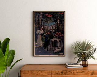 Vintage travel poster – Vichy, PLM, framed above a wooden dresser between plants.