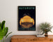 Vintage Automoto, Saint‑Étienne poster framed above a wooden dresser between plants.