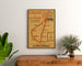 Vintage Circuit du Gâtinais, walking poster framed above a wooden dresser between plants.