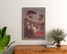 Vintage P.L.M. Hyères poster, framed above a wooden dresser, between plants.