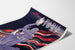 Vintage Paris poster 1937, Arts and Techniques, shown on a curved sheet, viewed in perspective.