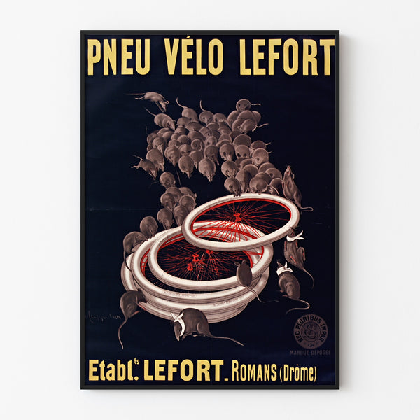 Vintage poster Lefort bicycle tires, displayed in a slim frame on a light wall.