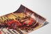Vintage poster Saint-Cloud, patronal festival, displayed on a curved sheet, perspective view.