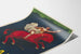 Vintage Cinzano poster of a man on a red horse