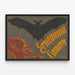 Vintage poster of Ernemann camera with demon and bat — framed artwork on a wall