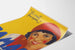 Vintage poster of oranges with a smiling female portrait