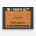 Vintage wall decoration poster of Schumann porcelain and kitchen utensils — framed artwork on a wall