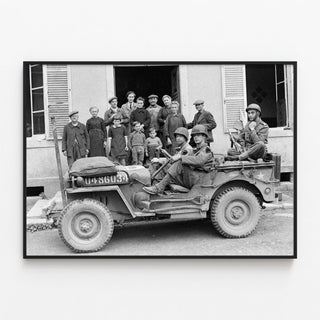 Military jeep with soldiers and civilians - Normandy landings — framed artwork on a wall