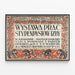 Vintage poster for the artistic exhibition Izba in Kraków — framed artwork on a wall