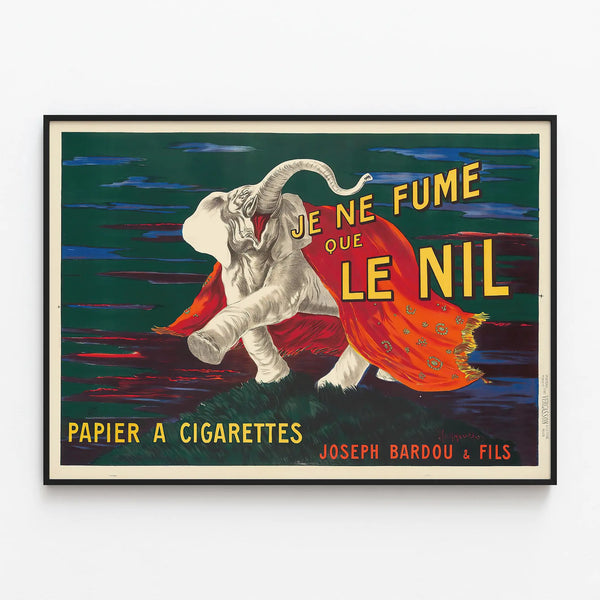 Vintage advertising poster 'Je ne fume que le Nil' with elephant — framed artwork on a wall