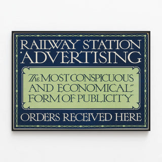 Vintage Railway Station Advertising Poster — framed artwork on a wall