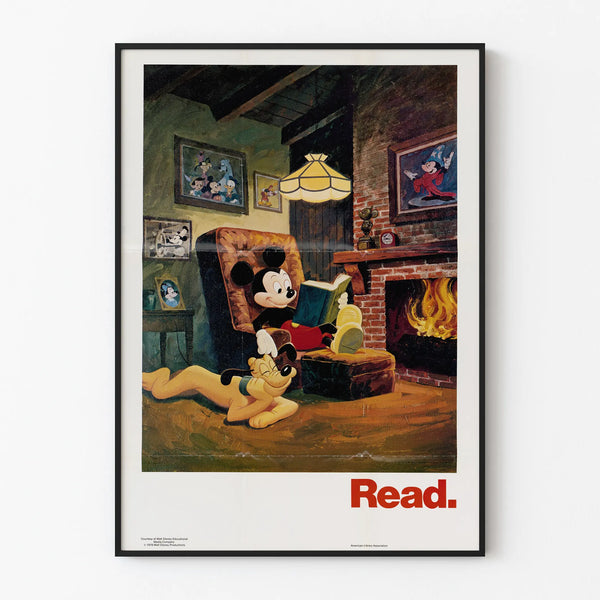 Mickey Mouse wall decoration poster reading by the fireplace