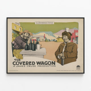 Vintage Western Poster The Covered Wagon — framed artwork on a wall